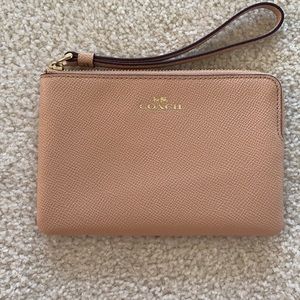 Pink/rose colored Coach wristlet - excellent condition